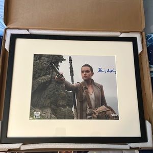 This is a signed picture of Daisy Ridley from Star Wars
